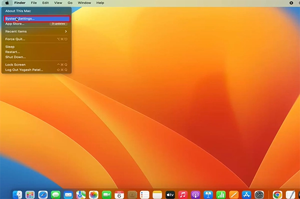 an Apple screen highlighting System Settings