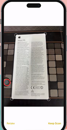 an iPhone clicking the picture of a document in Notes app